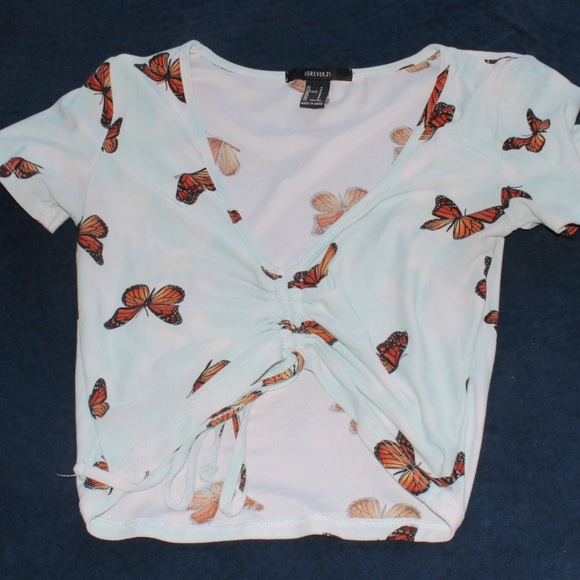 Forever 21 Tops - Light blue drawstring cropped top with butterfly’s